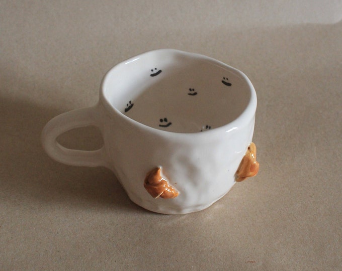 Handmade Ceramic Croissant Mug: Smiley Face Pottery Coffee Cup