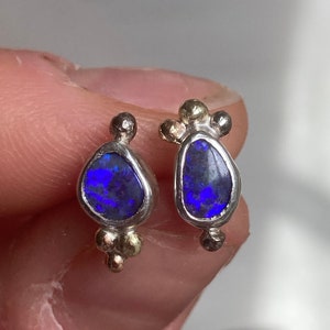 Violet boulder opal earring studs. Sterling silver, 14 k white gold and 14 k yellow gold details. image 1