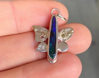 Boulder opal sterling silver and 14 karat gold details - stormy dark blue butterfly with green shimmers. Charm, pendent, necklace, artisan