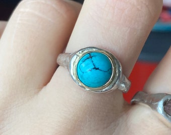 Hubei turquoise seated in 14 karat gold. Sterling silver ring caste from wax. Hand carved, artisan, unique, ethnic, funky, one-of-a-kind