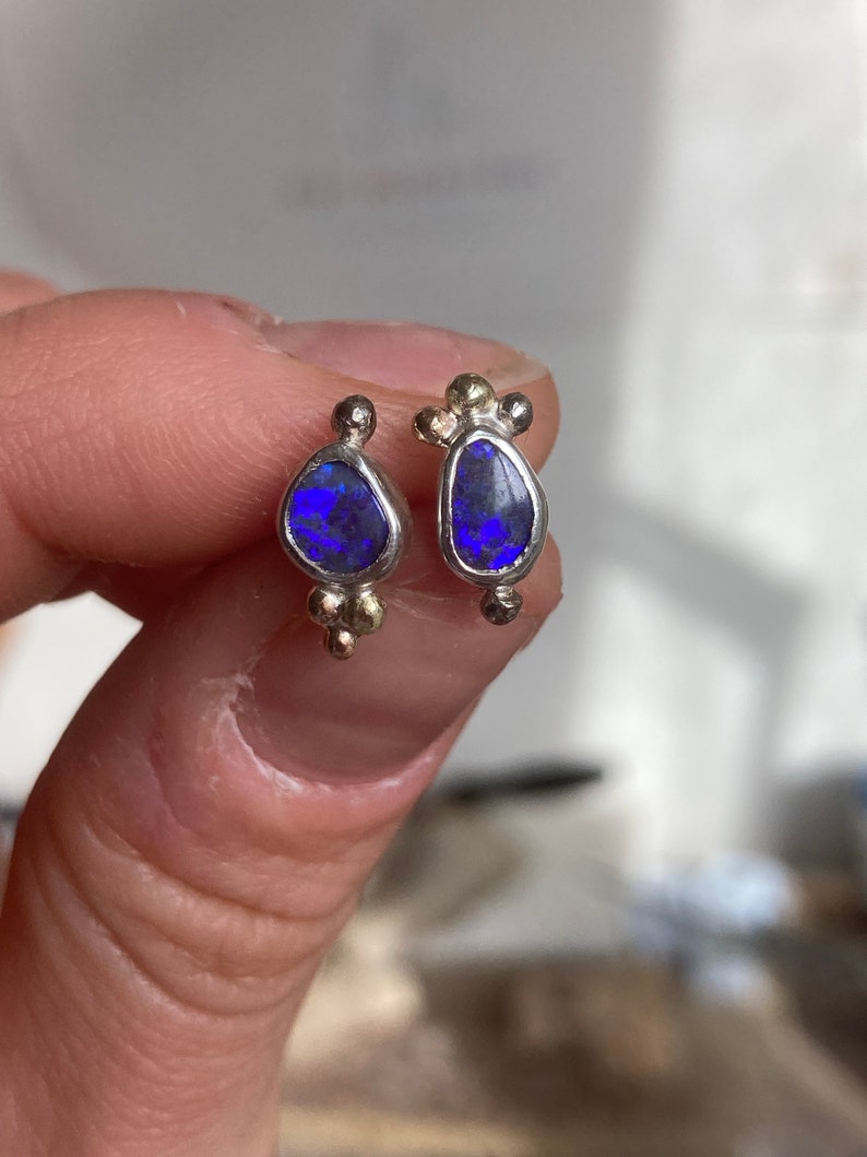 Violet boulder opal earring studs. Sterling silver, 14 k white gold and 14 k yellow gold details. image 1