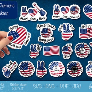 May include: 18 patriotic stickers featuring American flag designs, peace signs, sunflowers, and the text "Happy Birthday", "Rock America", "Peace Love Rock", "Peace Love America", "American Sunflower", "Wild Free", "Happy 4th Y'all", "My 1st Fourth", "Wild Free", "My First 4th", "Happy 4th Y'all", "All USA Dude", and "Happy Birthday".