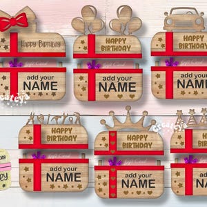 May include: Ten wooden gift box toppers with a red ribbon, balloons, a car, and a crown. Each topper has a "Happy Birthday" message and a space to add a name.