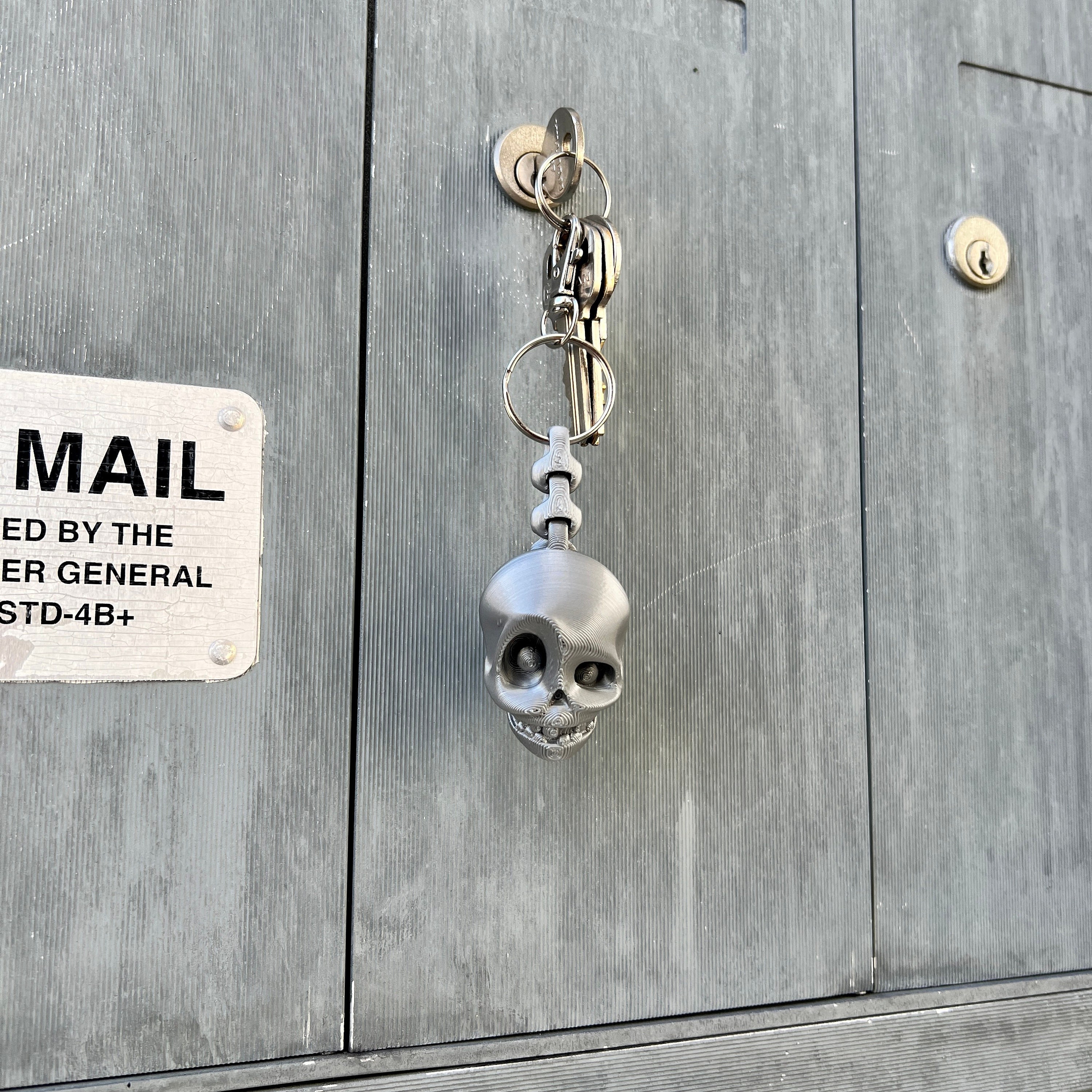 Skull Keychain Flexi Spine 3D Printed Print With 360 Metal Swivel