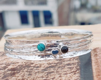 Bracciale girevole in argento sterling 925 con turchese e onice nera