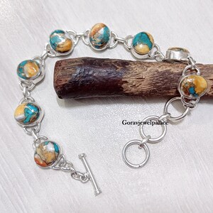 Handmade Oyster Turquoise Bracelet: Oval Gemstone, 925 Silver