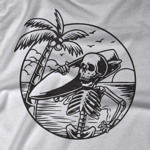 May include: Black and white illustration of a skeleton surfing on a wave with a palm tree in the background.