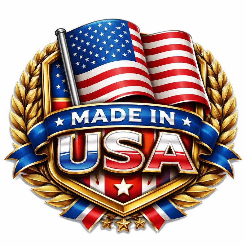 May include: A circular emblem featuring a waving American flag at the top, centered over a shield with red and white stripes and a white star. A blue ribbon across the center displays the text MADE IN USA in bold, metallic, white-outlined letters.