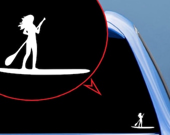 May include: White silhouette of a person paddleboarding on a black background. The image is a sticker that can be applied to a car window.