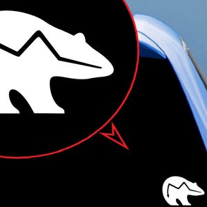 May include: White silhouette of a bear with a mountain range inside its body, on a black background. The bear is facing left. The image is in a speech bubble with a red outline.