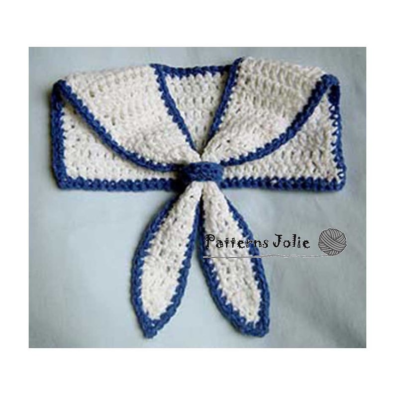 May include: White crocheted sailor collar with blue trim and a bow tie. The collar is tied at the front with a bow. The collar is made of white yarn with blue trim. The bow tie is made of white yarn with blue trim. The collar is a crochet pattern.