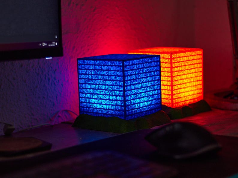 oneglyph rojo y azul emiten un resplandor conjunto, proyectando un aura de misterio y poder. Sus inscripciones antiguas, iluminadas en tonos cálidos y fríos, parecen contener secretos opuestos y complementarios