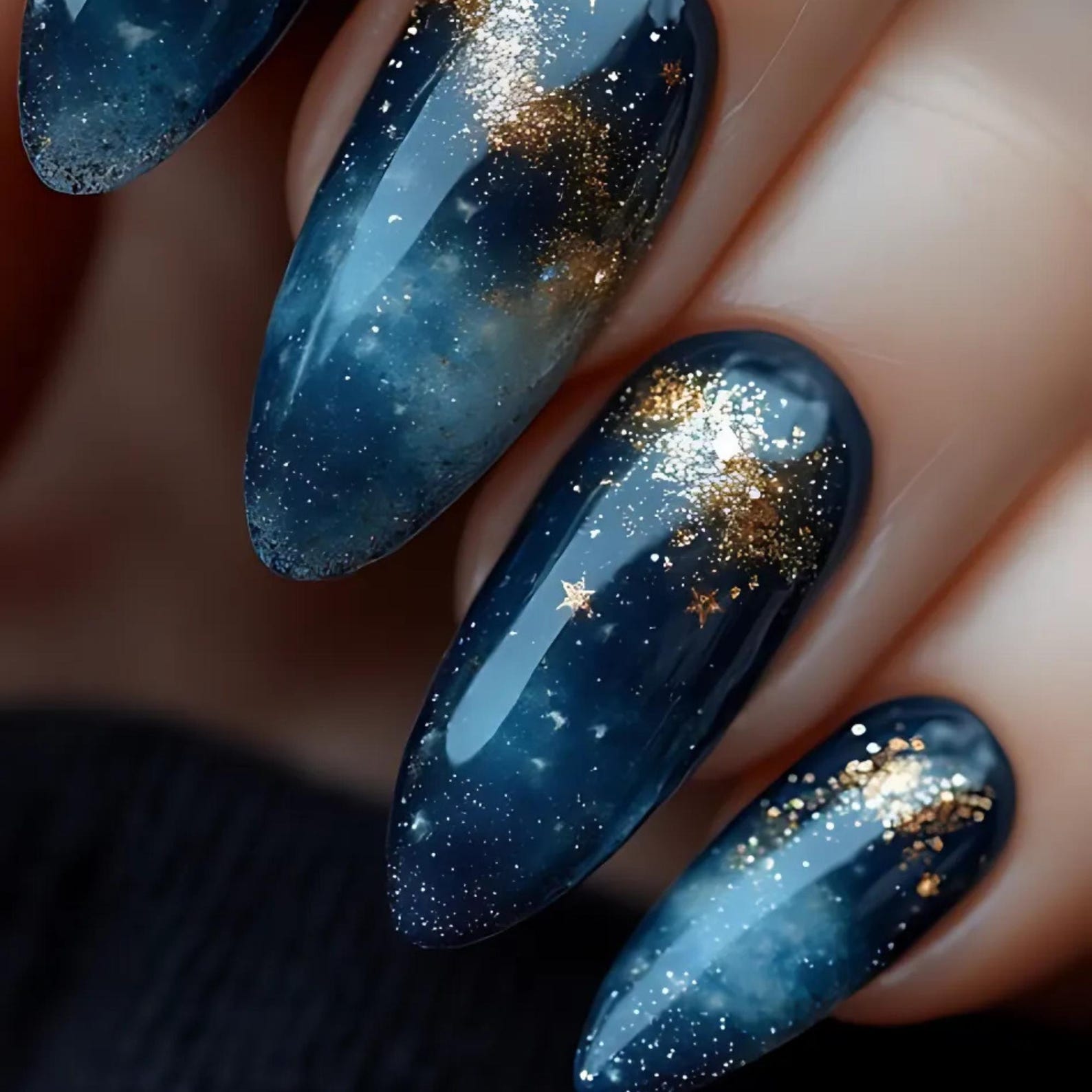Midnight blue nails with gold star art