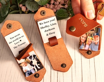 May include: Leather keychains with personalized photos and text. One keychain reads "POPS" and displays a family photo. Two other keychains have photos and the messages "You mean the world to us. Love The Trumps" and "We love you! Shelby, Lisa, Jackson & Ozzy."