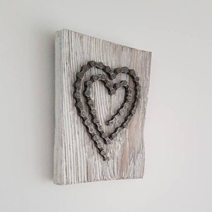 Two hearts made from a chain, as a symbol of love and connection - customizable