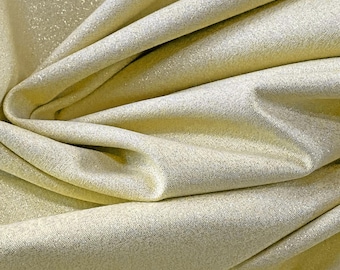 Cloud 9 fabrics Glimmer Solids w kolorze szampana 85 / 15% bawełny / metaliczny odpowiednio. Błyszcząca tkanina