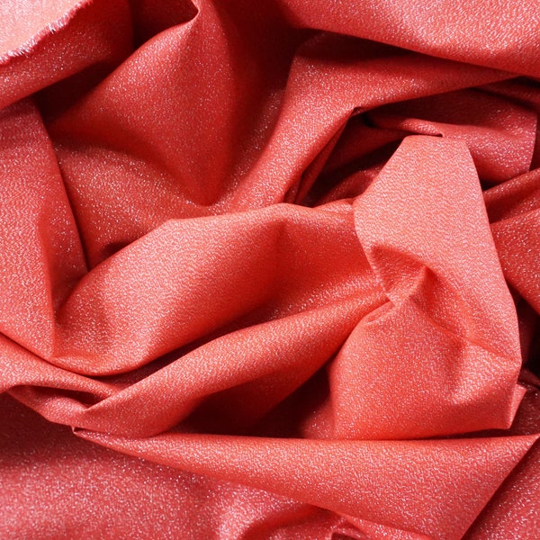 Cloud 9 fabrics Glimmer Solids in red 85 / 15 % Cotton / Metallic respectively. Sparkly fabric