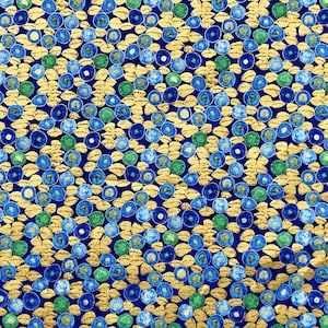 May include: A fabric featuring a repeating pattern of blue and green circles with gold accents on a navy blue background. The circles have a watercolour effect, creating a textured appearance. The design is dense and visually engaging.