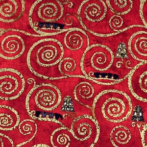 May include: Red fabric with a repeating pattern of gold swirls and small black and white shapes. The fabric has a textured surface.