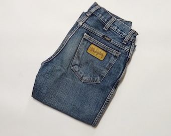 Jean bleu Wrangler des années 2000 - Jean taille moyenne booty cut Y2K avec braguette zippée et 4 poches - Jean bootcut Wrangler taille 27