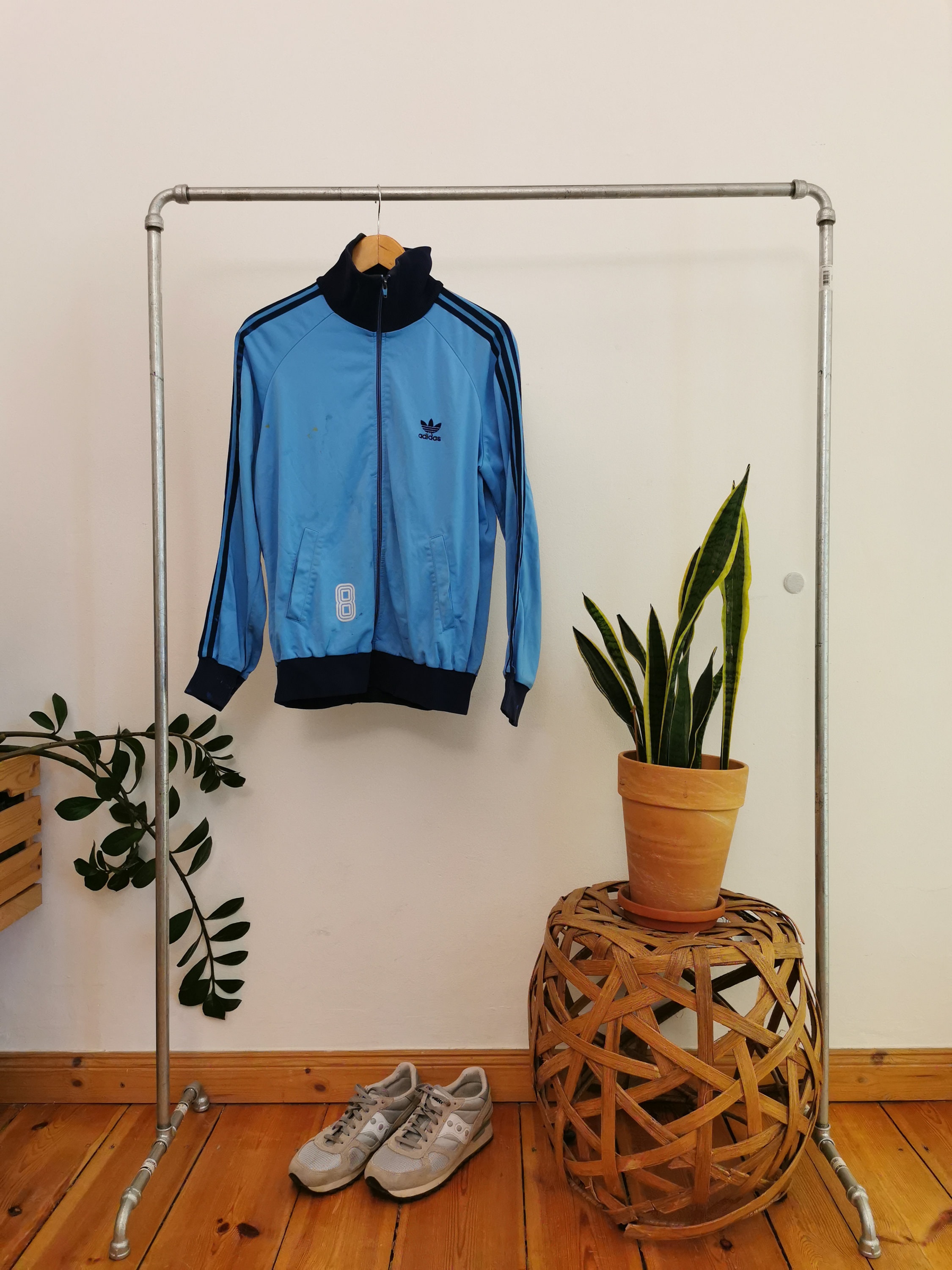 Light blue deals adidas track top