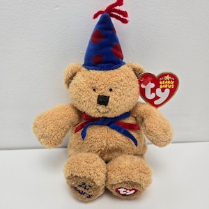Ty Beanie Baby “Risada” o Urso de Aniversário (5,5 polegadas)