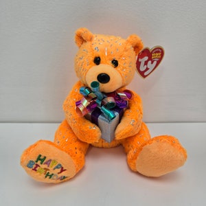Ty Beanie Baby Urso Laranja “Feliz Aniversário” Segurando Presente (7,5 polegadas)