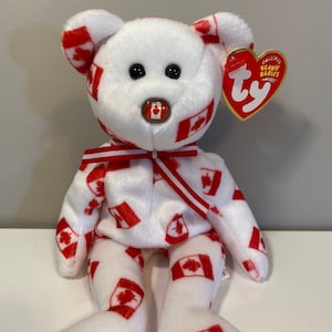 Ty Beanie Baby Discover the Bear - Exclusivo de Canadá - ¡con nariz con bandera! *RARO* (8,5 pulgadas)