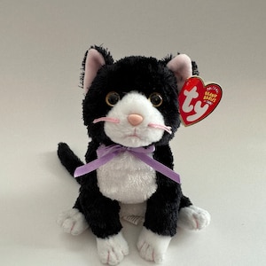 Ty Beanie Baby “Fussy” the Black and White Cat wearing a Purple Bow! (8 inch)