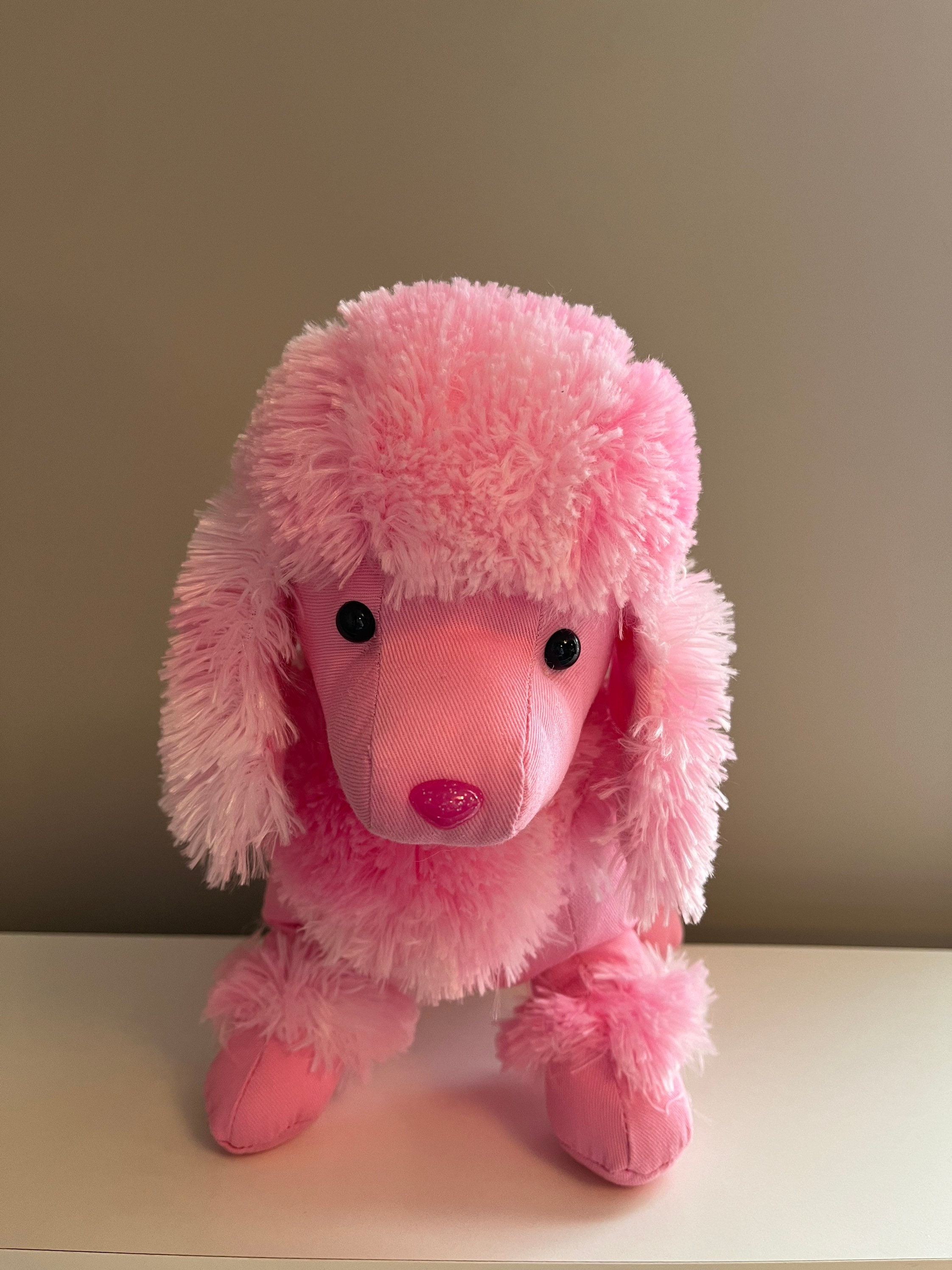stuffed pink poodle dog toy