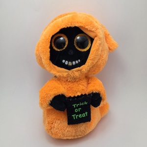 Ty Beanie Boo “Grinner” the Orange and Black Ghoul holding Trick or Treat Bag - No Hang Tag (Larger 9 inch)