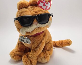 Ty Beanie Baby “Cool Cat” Garfield il gatto arancione! *Occhiali staccati da un lato*