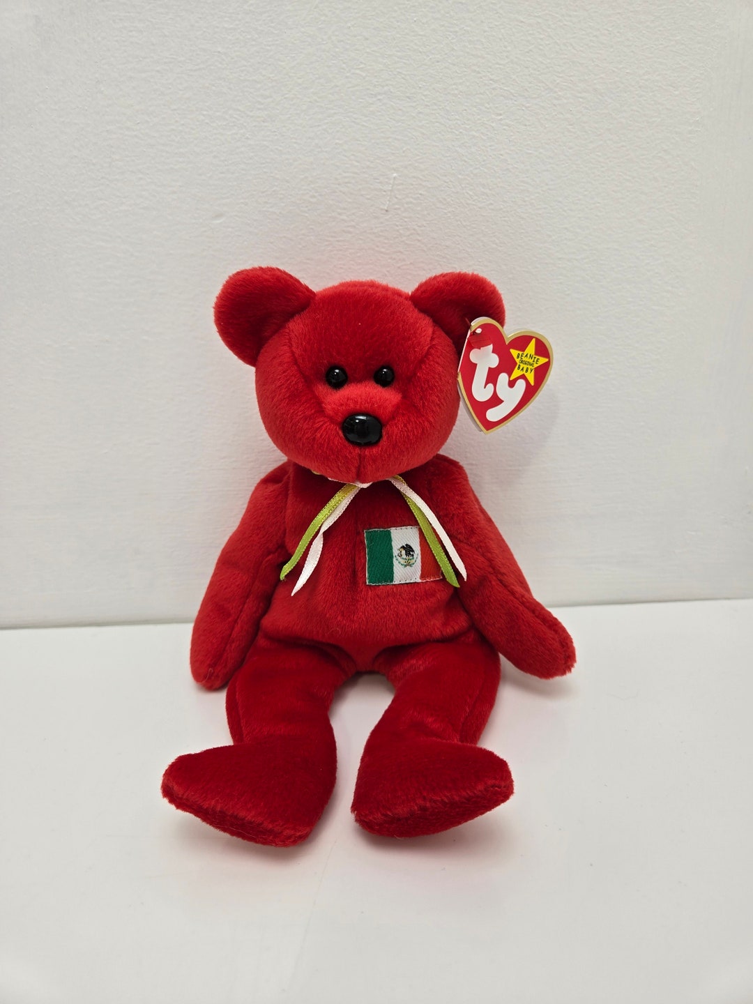 Ty Beanie Baby “osito” the Red Mexico Bear Wearing the Mexican