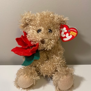 "Teddy Mütze ""2005 Holiday Teddy"" der Weihnachtsbär mit Weihnachtsstern 18 cm"