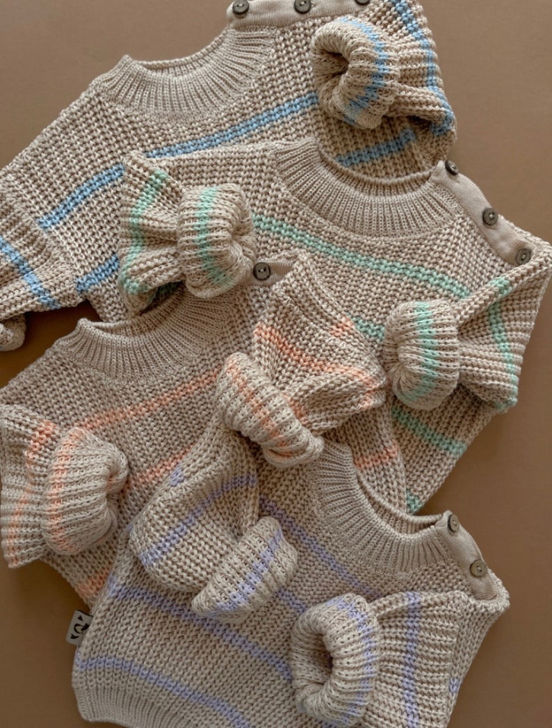 Newborn coming home outfit - baby knit sweater with buttons on the shoulder. Pregnancy Gift Idea