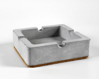 Classic ashtray made of concrete with a cork base