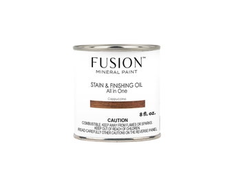 May include: A can of Fusion Mineral Paint Stain & Finishing Oil in the color Cappuccino. The can is 8 fluid ounces and has a caution label.