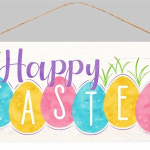 May include: A wooden sign with the text "Happy Easter" in purple lettering. The word "Easter" is surrounded by five colorful Easter eggs with white lettering.