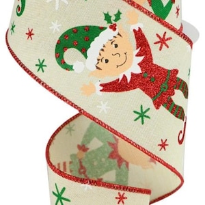May include: A 2.5-inch wide Christmas ribbon with a beige background and red, green, and white accents. The ribbon features a repeating pattern of elves with candy canes and snowflakes.
