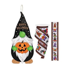 May include: A black and white Halloween gnome holding a jack-o-lantern. The gnome is wearing a black hat with white stars and the words "Happy Halloween". The gnome is also wearing a white beard and green hat. The gnome is surrounded by a white and brown ribbon with a repeating pattern of gnomes wearing hats and holding jack-o-lanterns.
