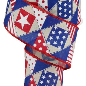 May include: Red, white, and blue patterned ribbon with a patchwork design featuring stars, stripes, and polka dots. The ribbon is 2.5 inches wide and has a wired edge.