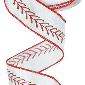 May include: White satin ribbon with a red baseball stitch design. The ribbon is 2.5 inches wide.