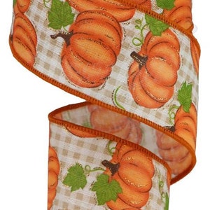 May include: Orange and green patterned ribbon with a gingham background featuring pumpkins. The ribbon has a wired edge.