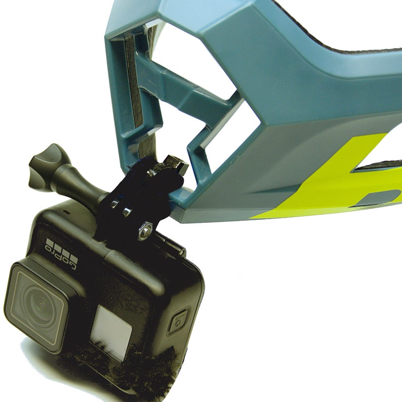 May include: A black GoPro camera mounted to a blue and yellow helmet with a GoPro mount.