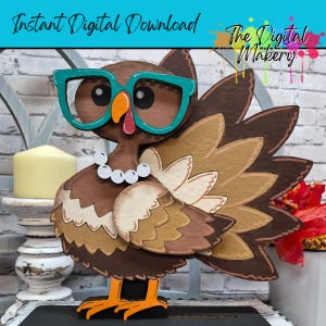 May include: A layered wooden turkey cutout featuring a brown body, a fanned tail with tan and dark brown feathers, bright orange feet, a white beaded necklace, and large teal-rimmed glasses with an orange beak and a red wattle.