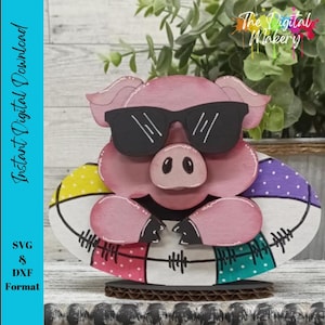 May include: A pink pig wearing sunglasses and a colorful life preserver. The pig is sitting on a wooden base. The Digital Makery logo is in the background.