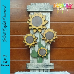May include: A decorative wall hanging featuring four sunflowers with yellow petals and dark brown centres, arranged on a vertical white-washed wooden plank background with horizontal slats at the top and bottom. The text reads Instant Digital Download.