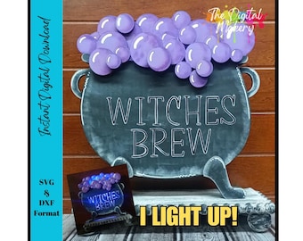 May include: A black cauldron cutout with purple bubbles on top, featuring the white text WITCHES BREW. The design includes a smaller square preview image and the text I LIGHT UP! at the bottom, with side text reading Instant Digital Download.