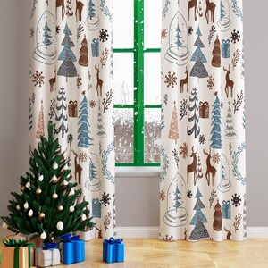 May include: A pair of white curtains with a Christmas-themed pattern featuring brown reindeer, blue and brown trees, and snowflakes. The curtains are hung in front of a window with a green frame.
