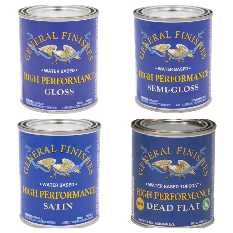 May include: Four cans of General Finishes High Performance water-based paint in gloss, semi-gloss, satin, and dead flat finishes. Each can features a blue and white eagle logo and the text "General Finishes" in a white circle.